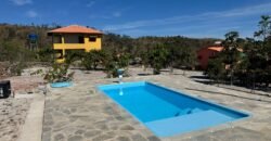🏡 VENDE-SE LINDA CHÁCARA COM POUSADA EM PLENO FUNCIONAMENTO EM ALTO PARAÍSO DE GOIÁS! 🌿